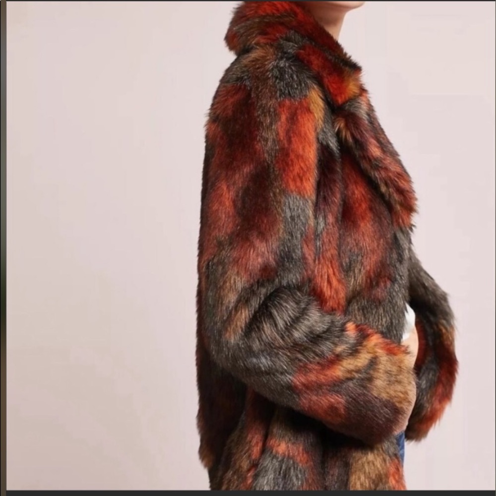 $125.00* Anthropologie
faux teddy coat Size 4